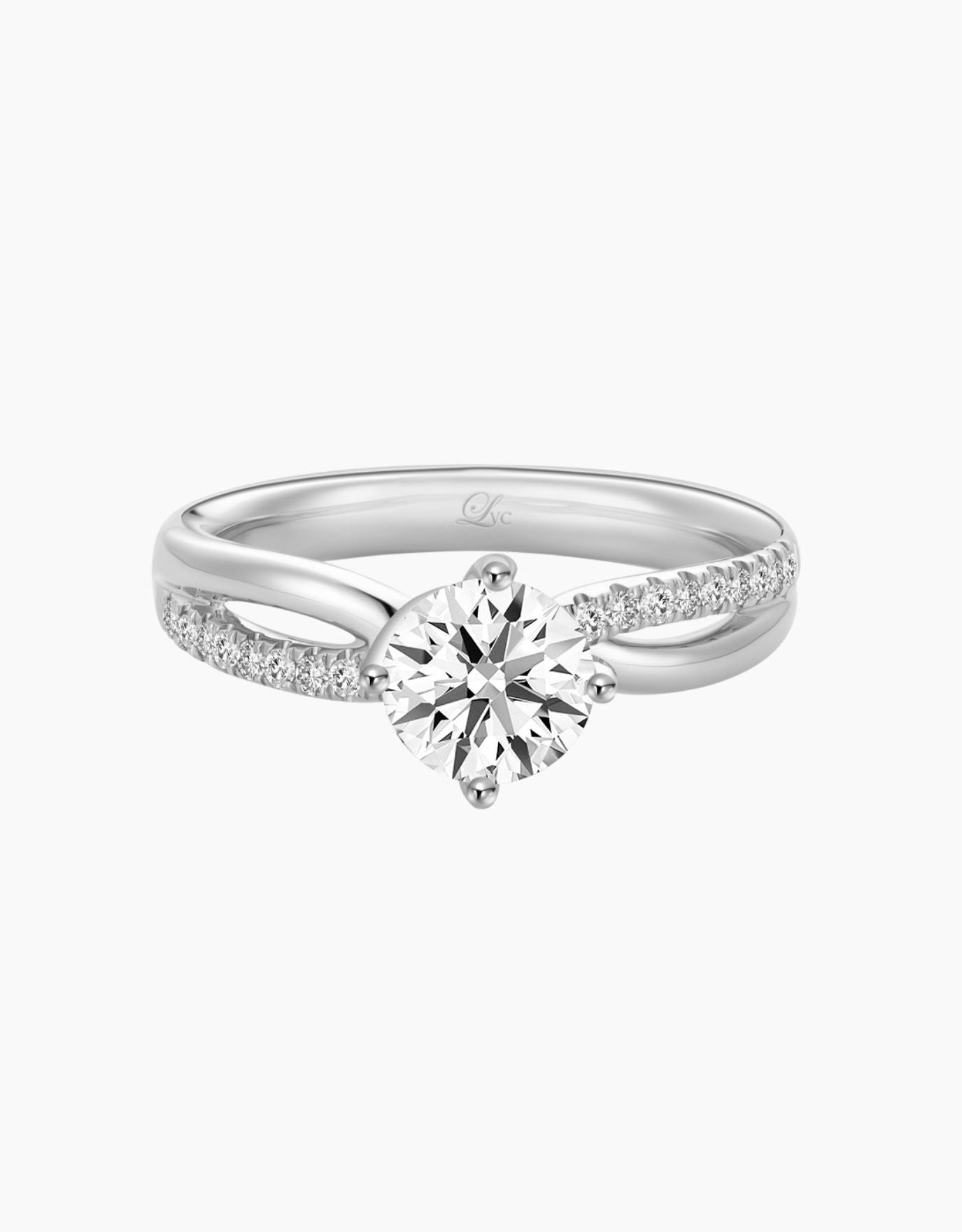 LVC lab grown diamond ring in white gold with two bands intertwining to become a cross and four prongs holding the diamond