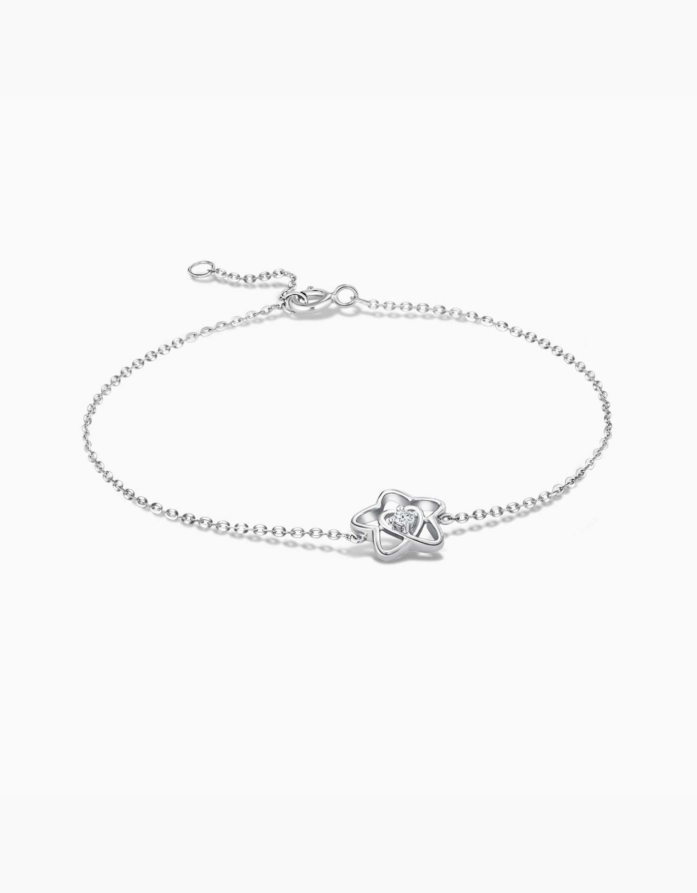 LVC diamond bracelet in white gold with a star charm and a heart inside the star