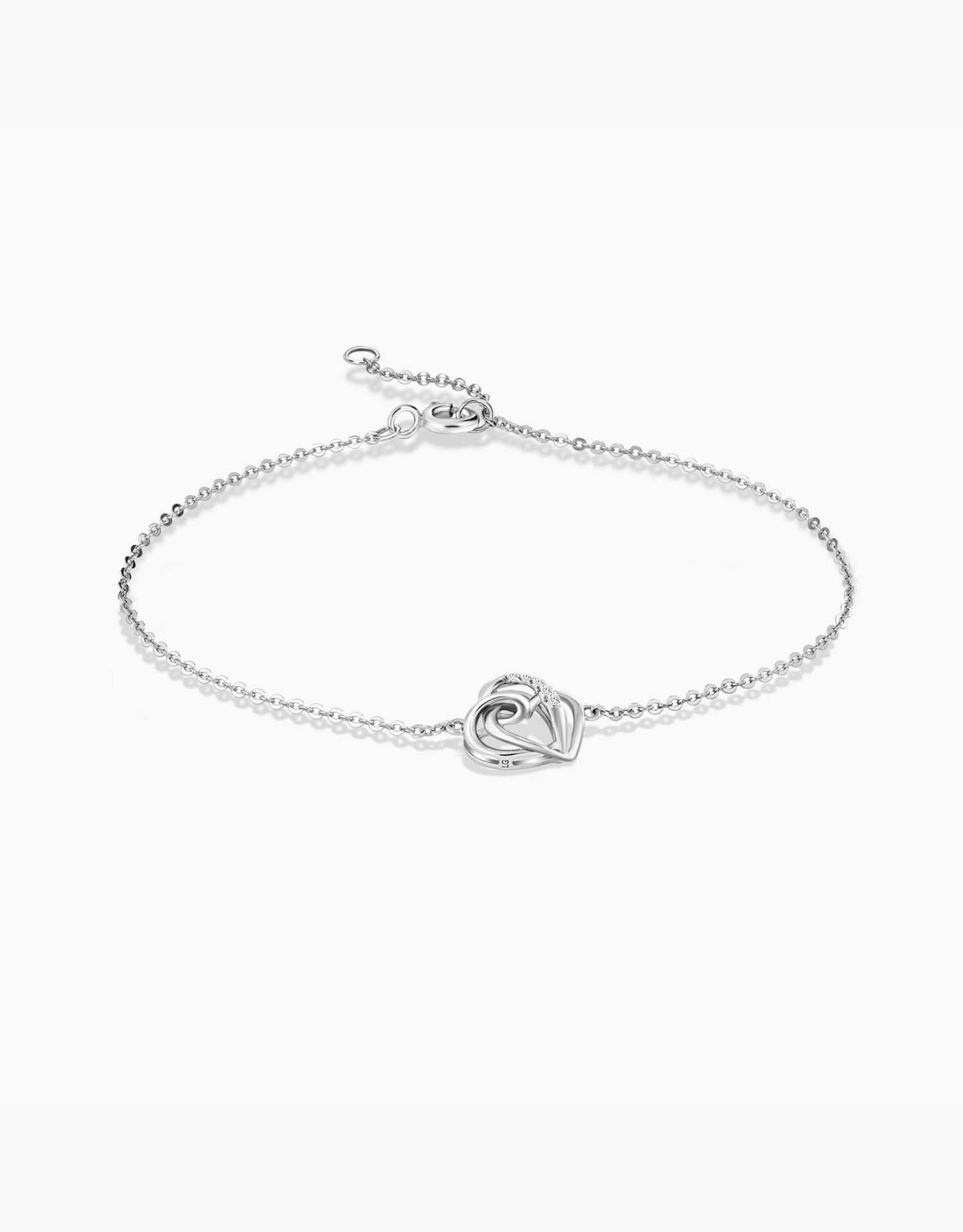 LVC diamond bracelet in white gold with two entwined hearts