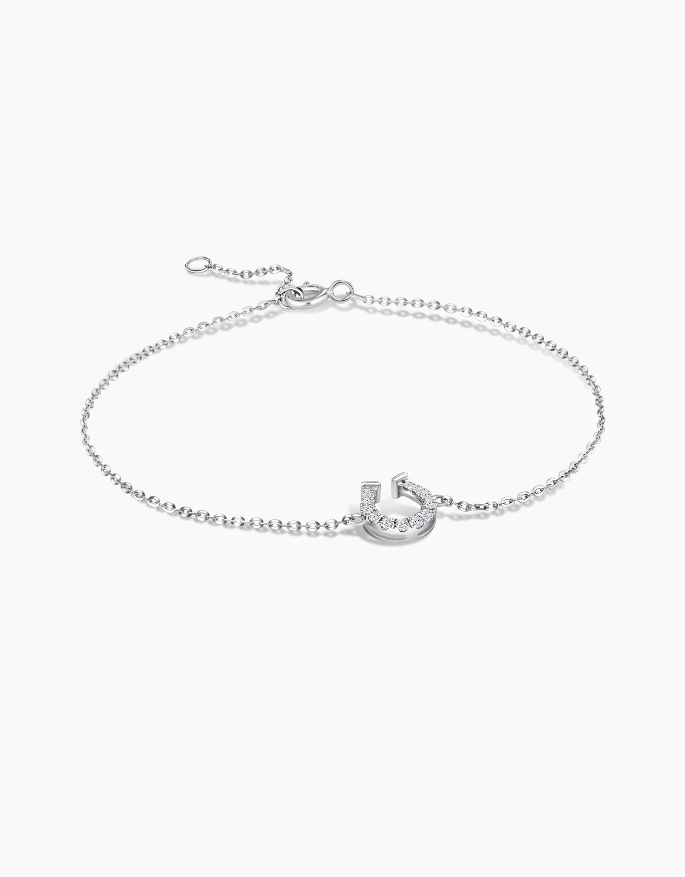 LVC diamond bracelet with horseshoe design as a charm in white gold