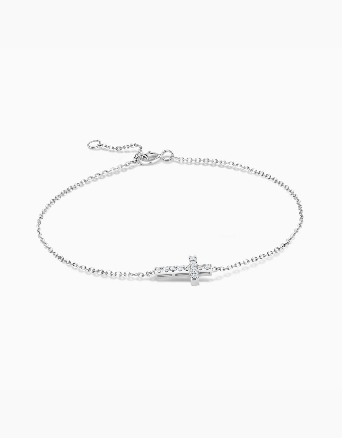 LVC diamond bracelet with a cross charm encrusted with diamonds in white gold