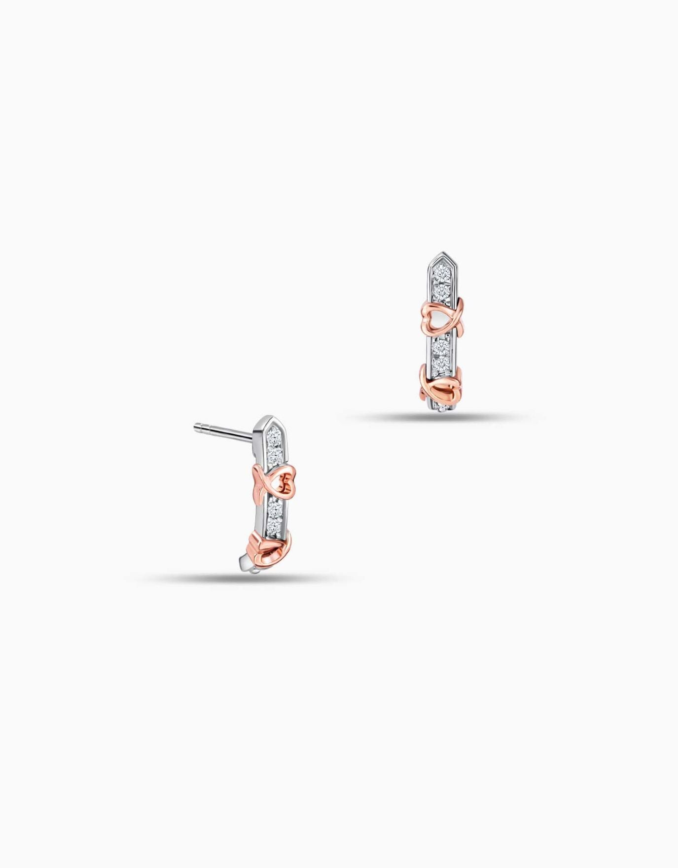 LVC diamond earrings with a straight vertical design encrusted with diamonds in white gold and dainty rose gold bows