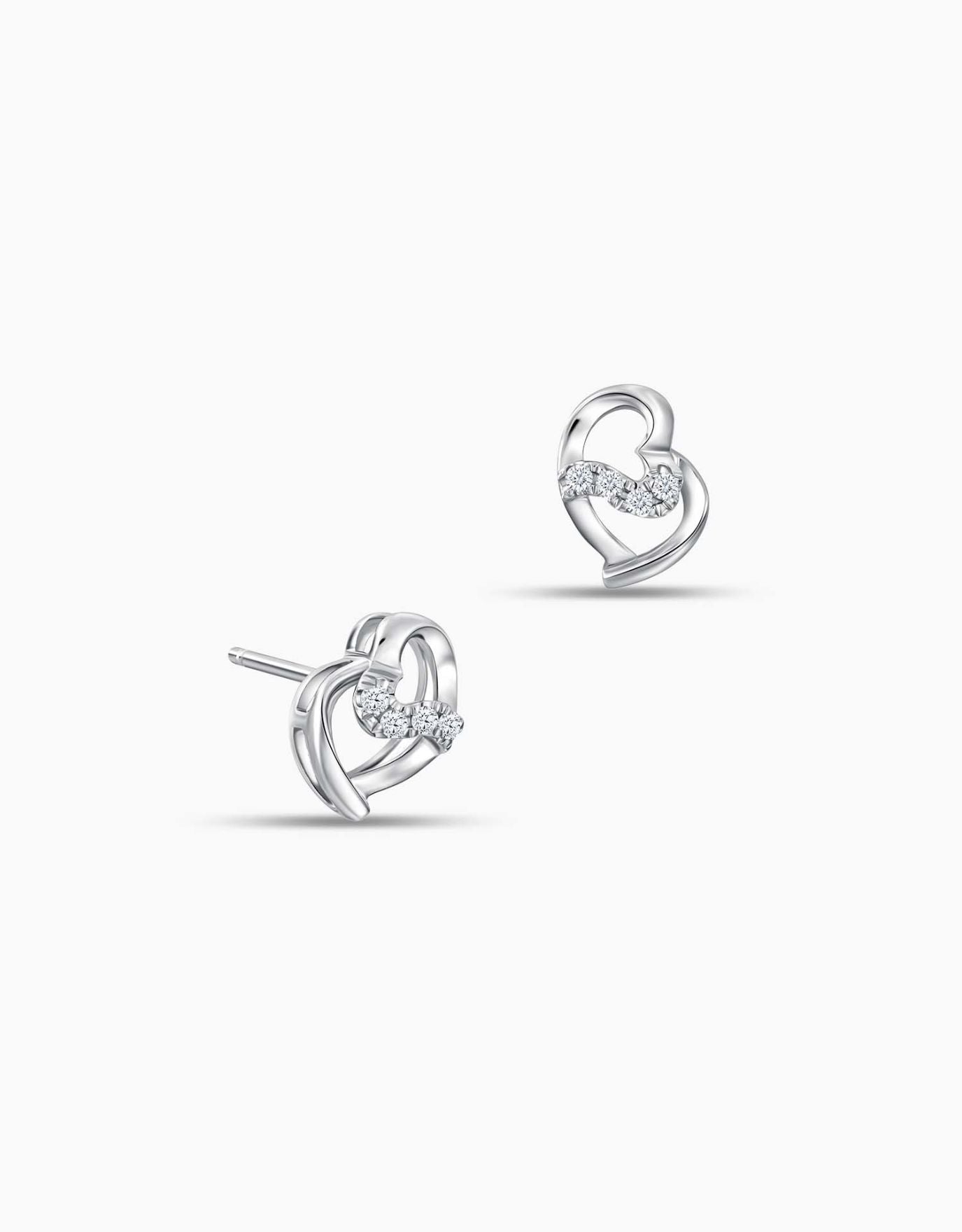 LVC diamond earrings with irregular heart shaped design and diamonds in white gold