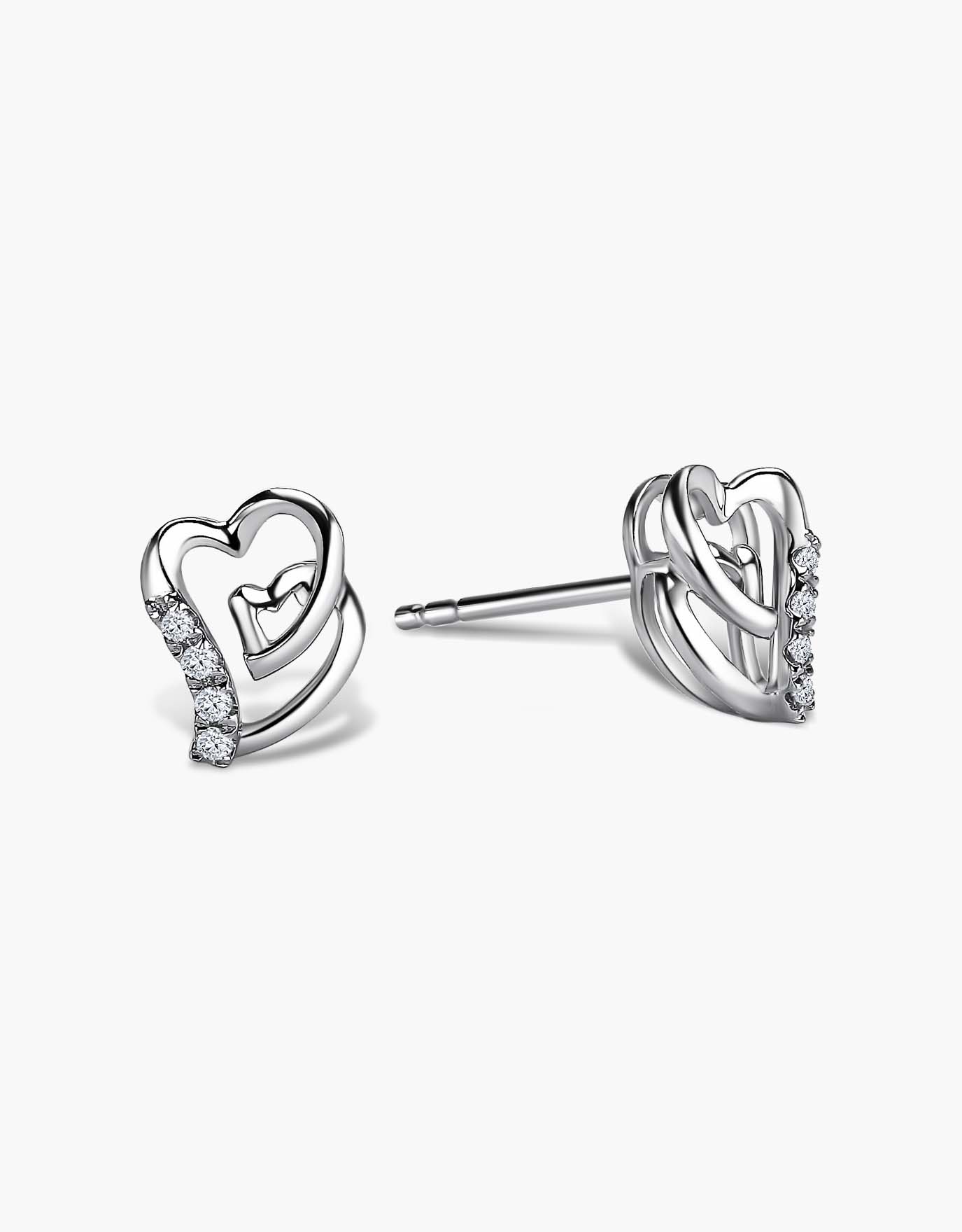 LVC diamond earrings with a swirled heart shape in white gold with four diamonds