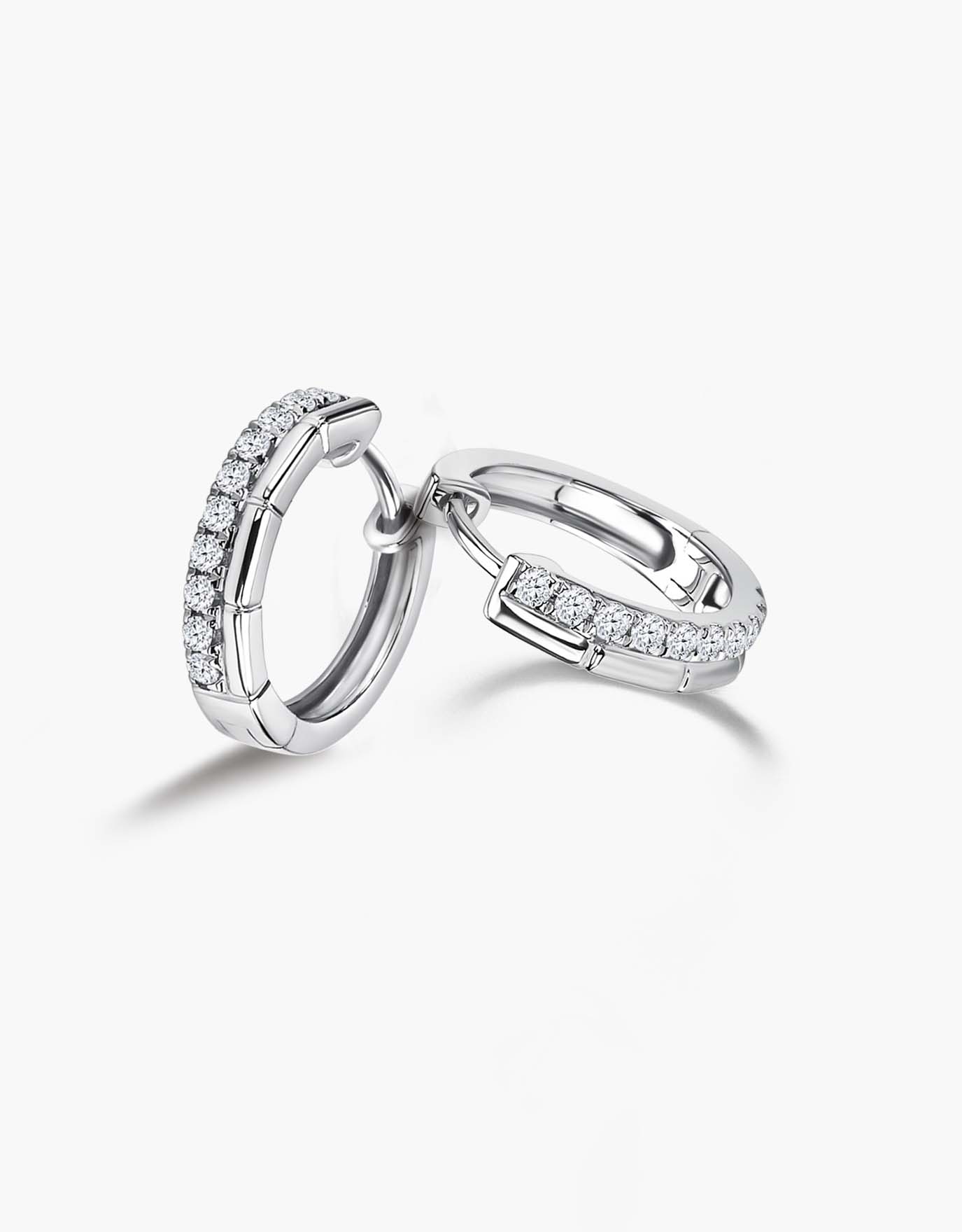 LVC diamond hoop earrings with diamonds halfway through in white gold material