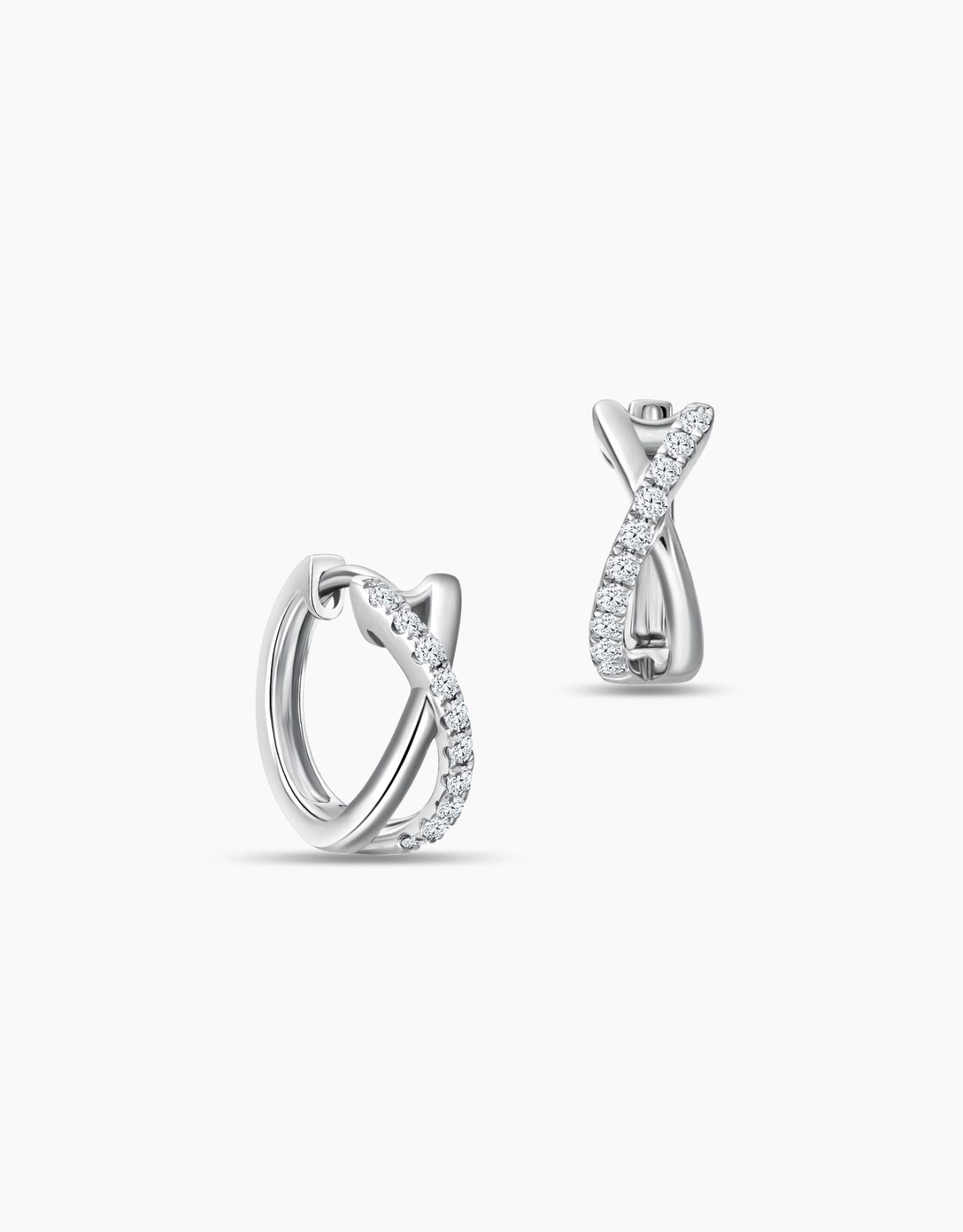 LVC diamond earrings in white gold with crossed design