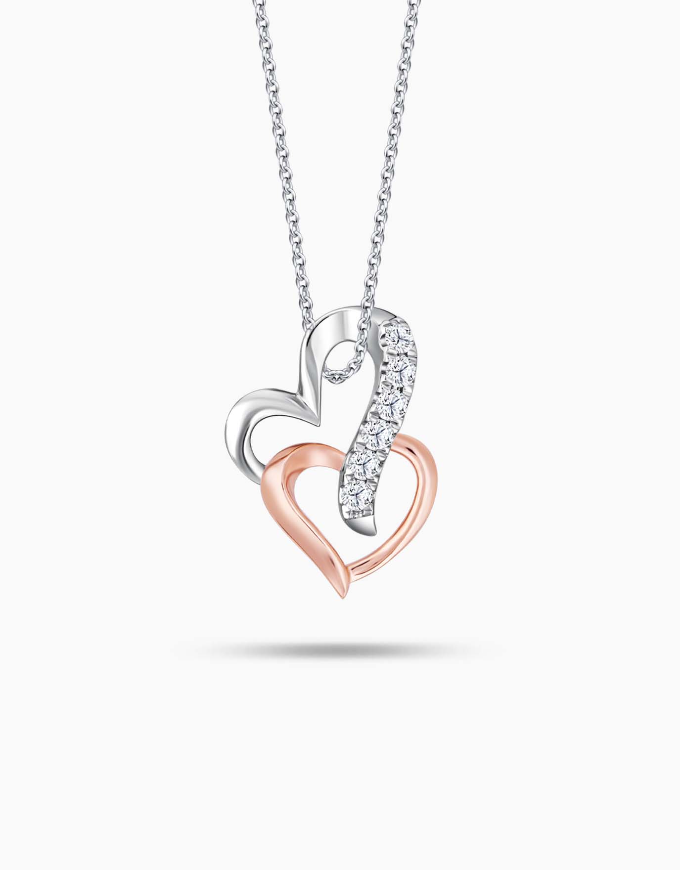 LVC necklace features two intertwined white and rose gold hearts encrusted with diamonds