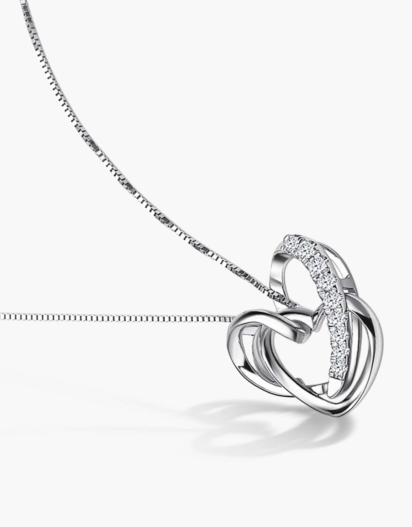 LVC white gold necklace with a pendant of two overlapping hearts encrusted with diamonds