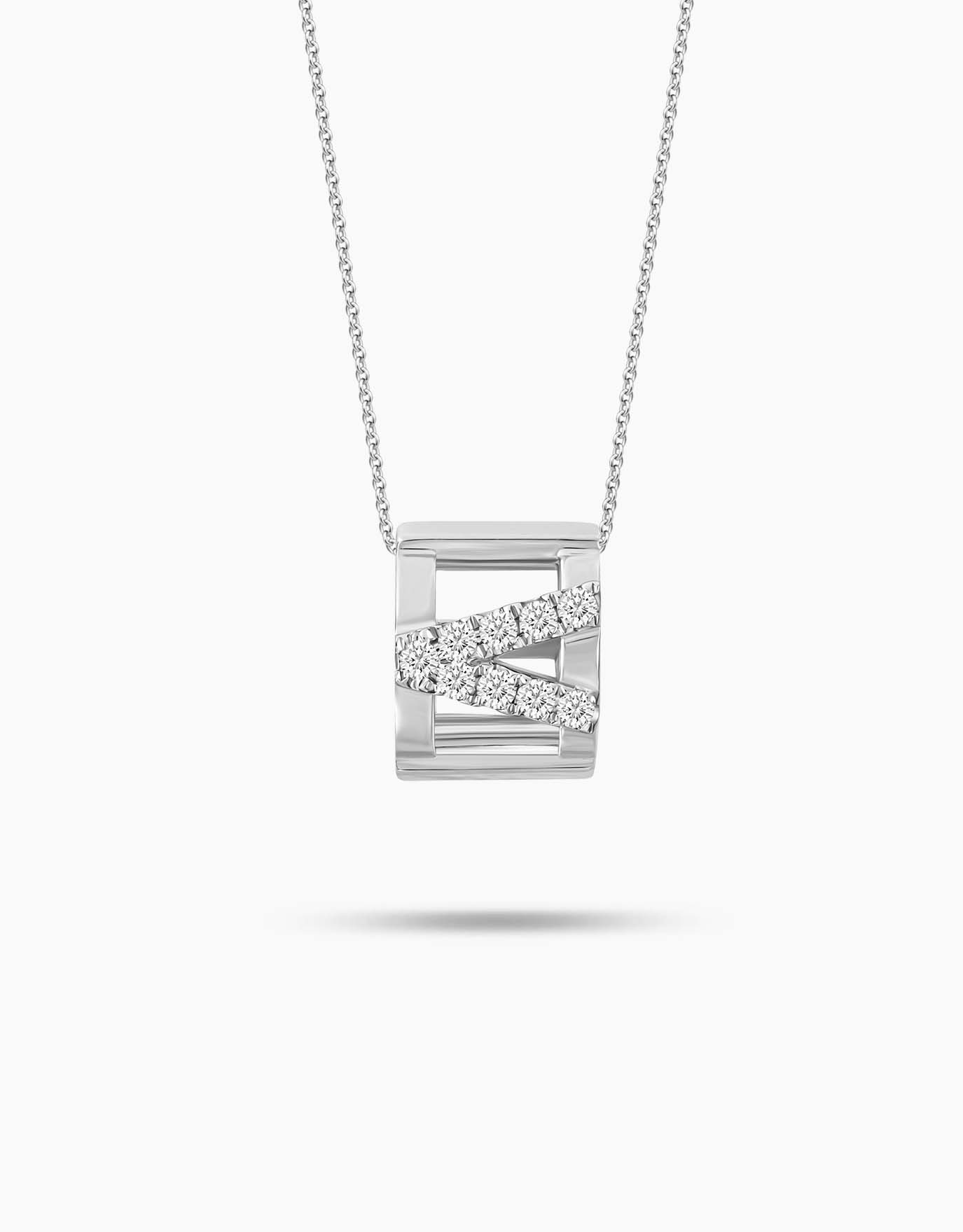 LVC necklace in white gold designed in the shape of a barrel with diamonds lined into a v shape