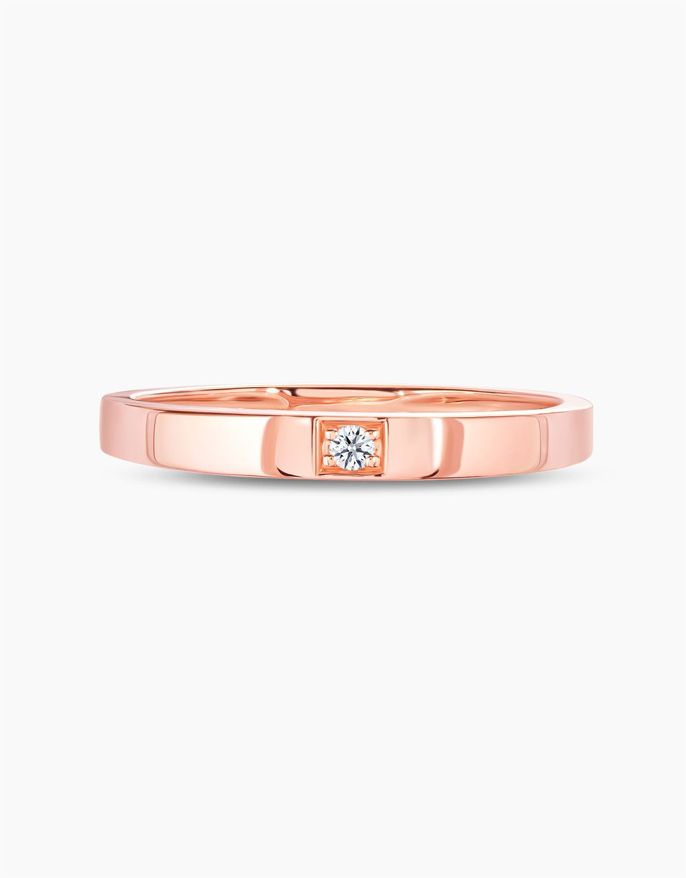 LVC men wedding ring in 14k rose gold encrusted with a single diamond