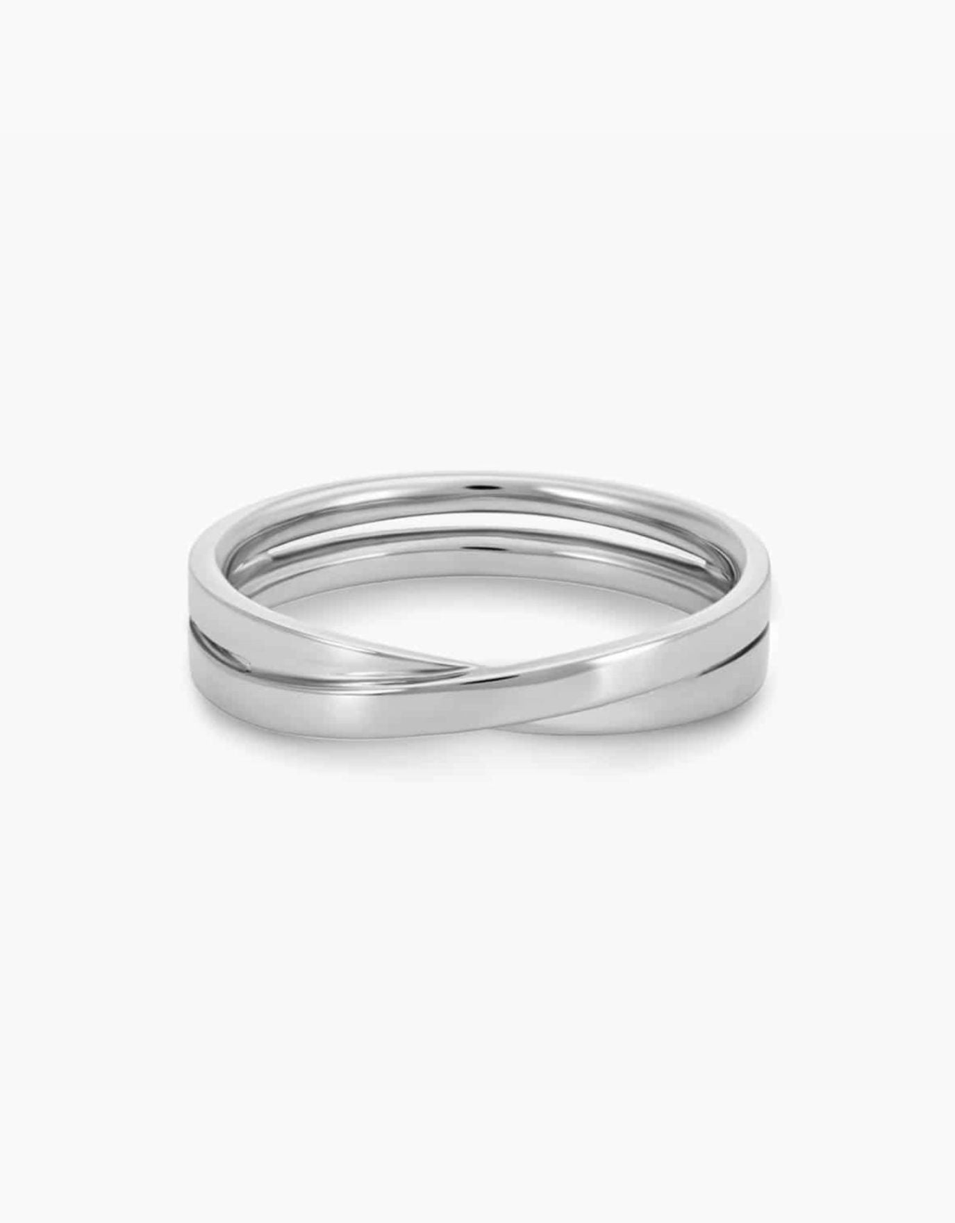 LVC men wedding band in white gold with glossy finish designed with a unique cross on the band for simplicity and elegance