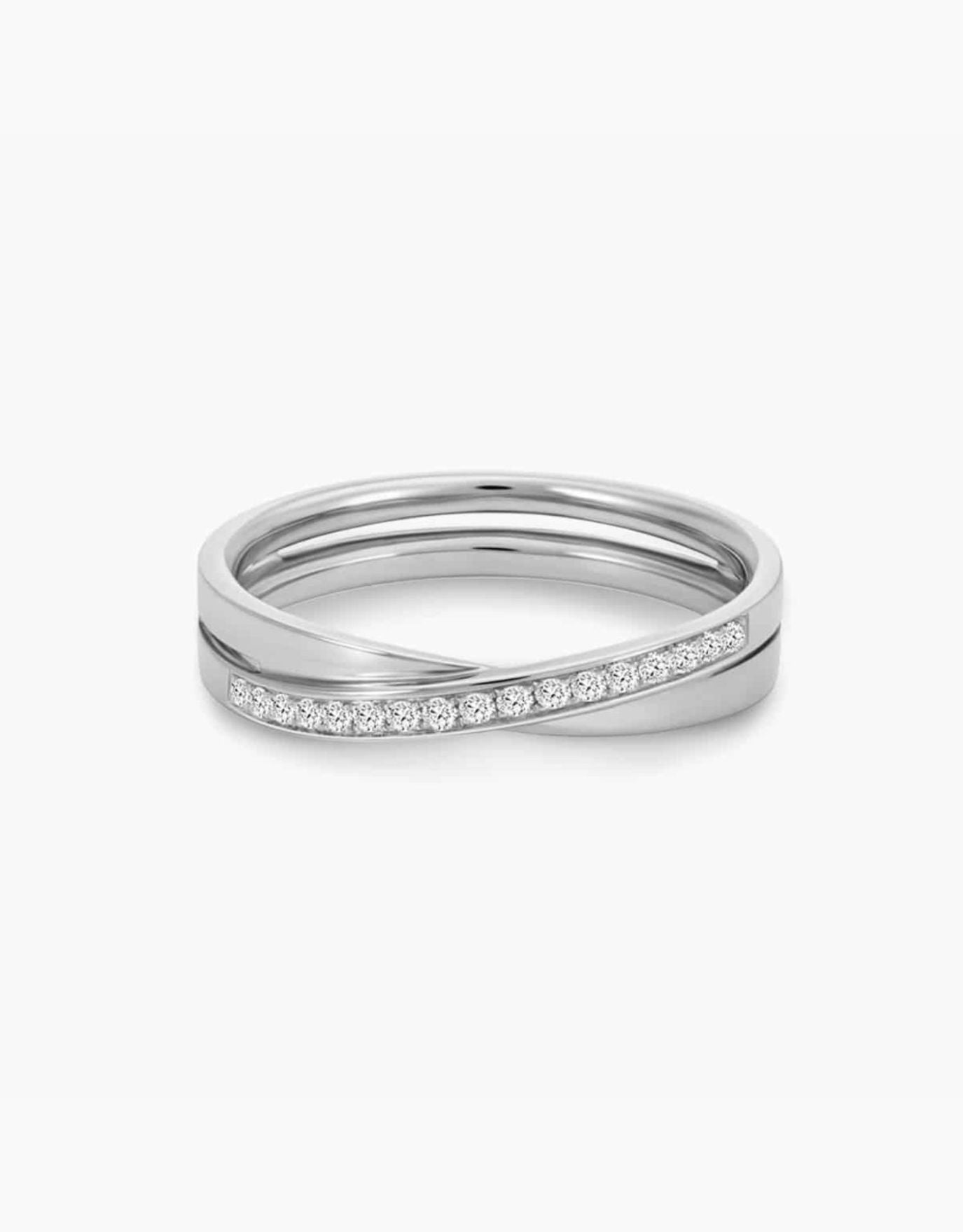 LVC wedding band in white gold designed with a unique cross on the band fitted with a row of stunning diamonds that runs across the ring