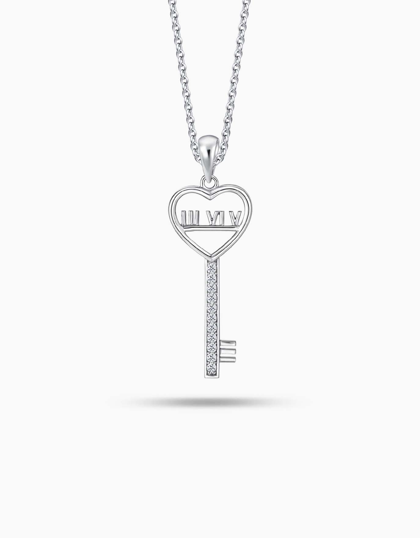 LVC necklace in white gold with a key pendant designed with roman numerals encrusted with a line of round diamonds