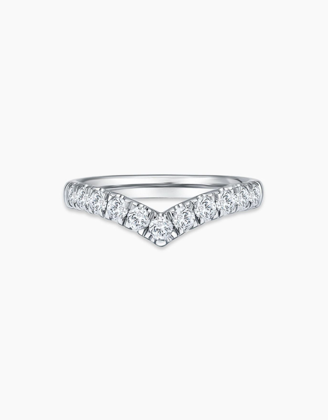 LVC wedding band in white gold crafted to be reminiscent of a classic V-line, and adorned with stunning diamonds that glisten in the light