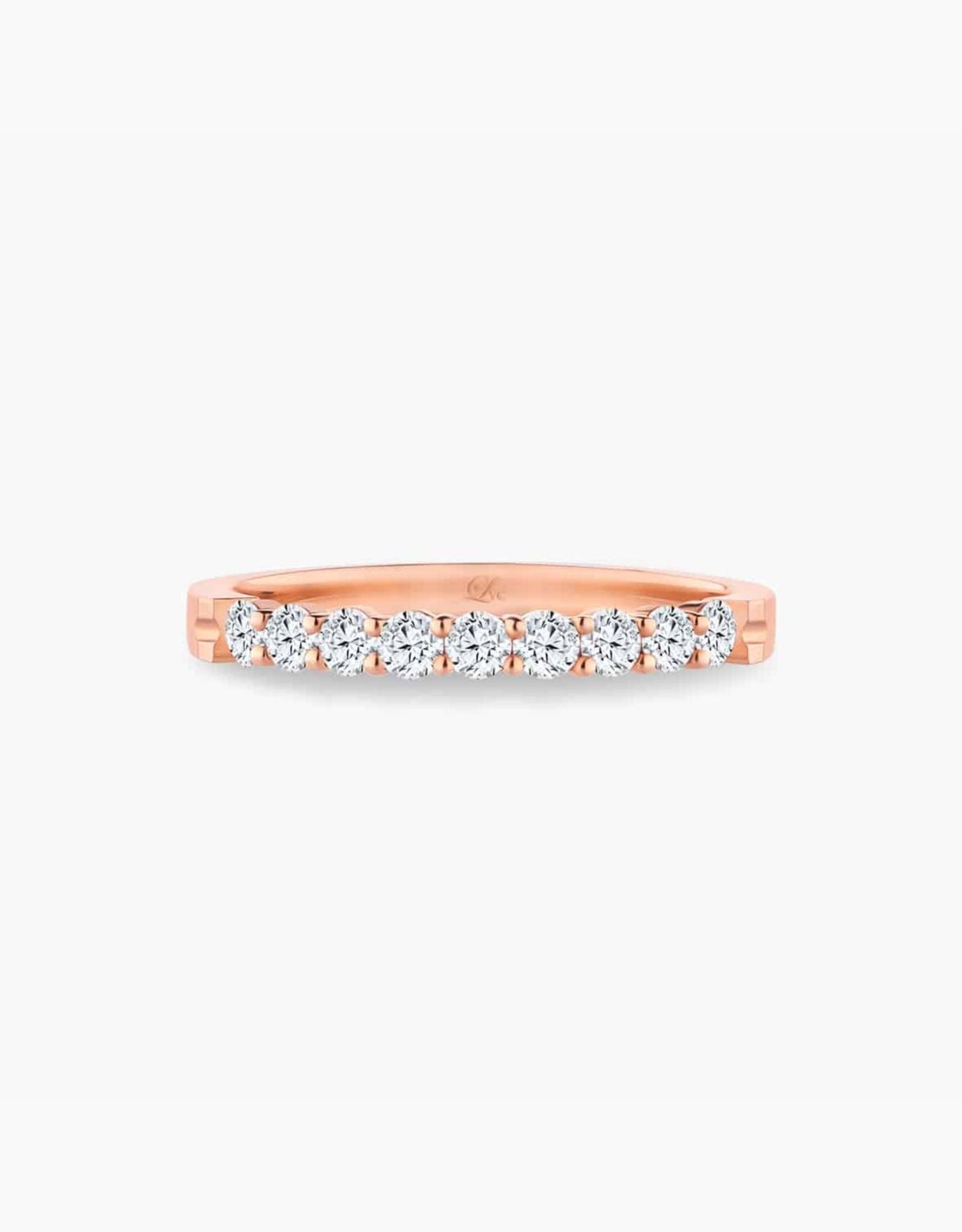 LVC Wedding Band in Rose Gold lined with a dazzling row of round diamonds