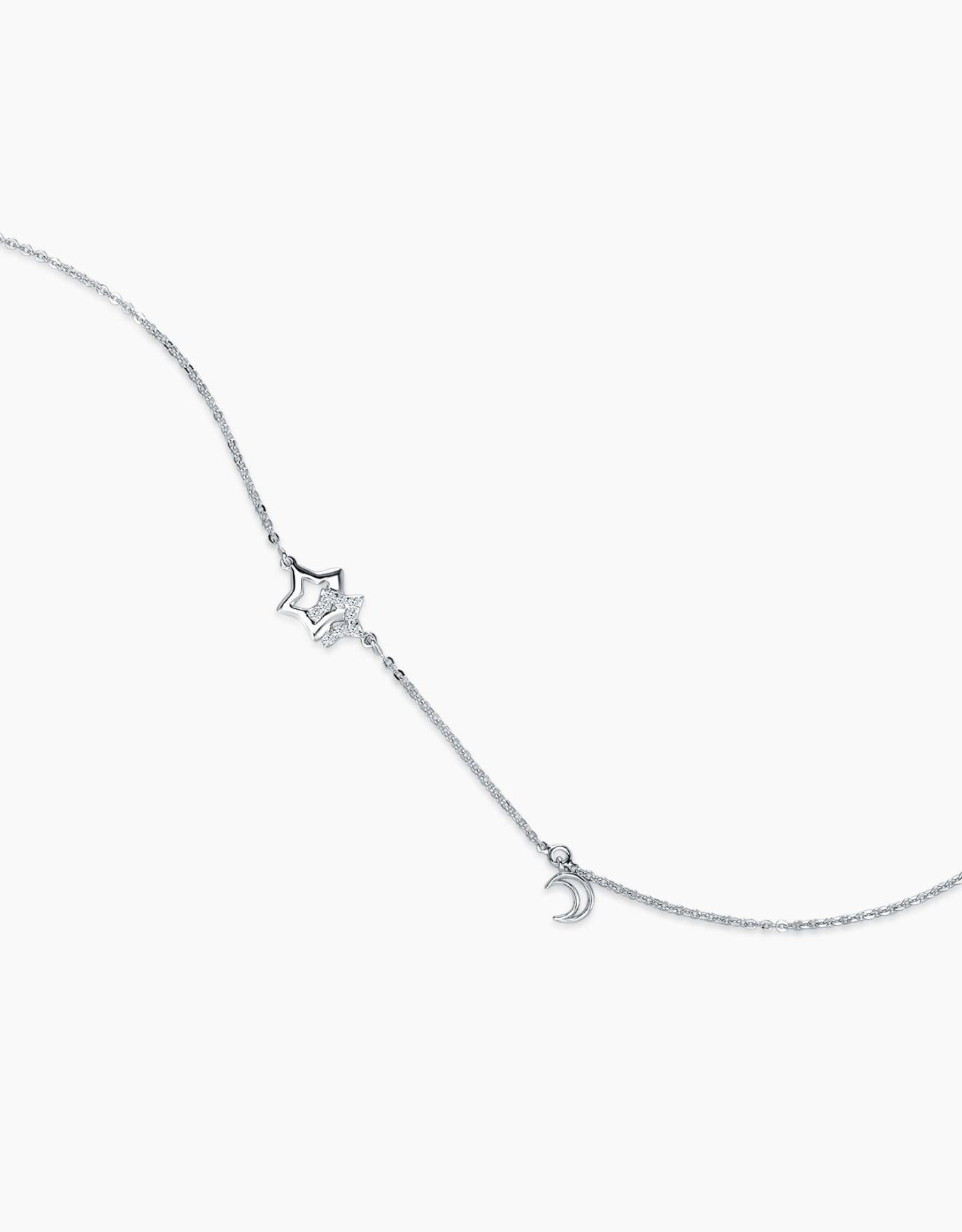 LVC bracelet in white gold designed with moon and stars with round diamonds encrusted on the stars