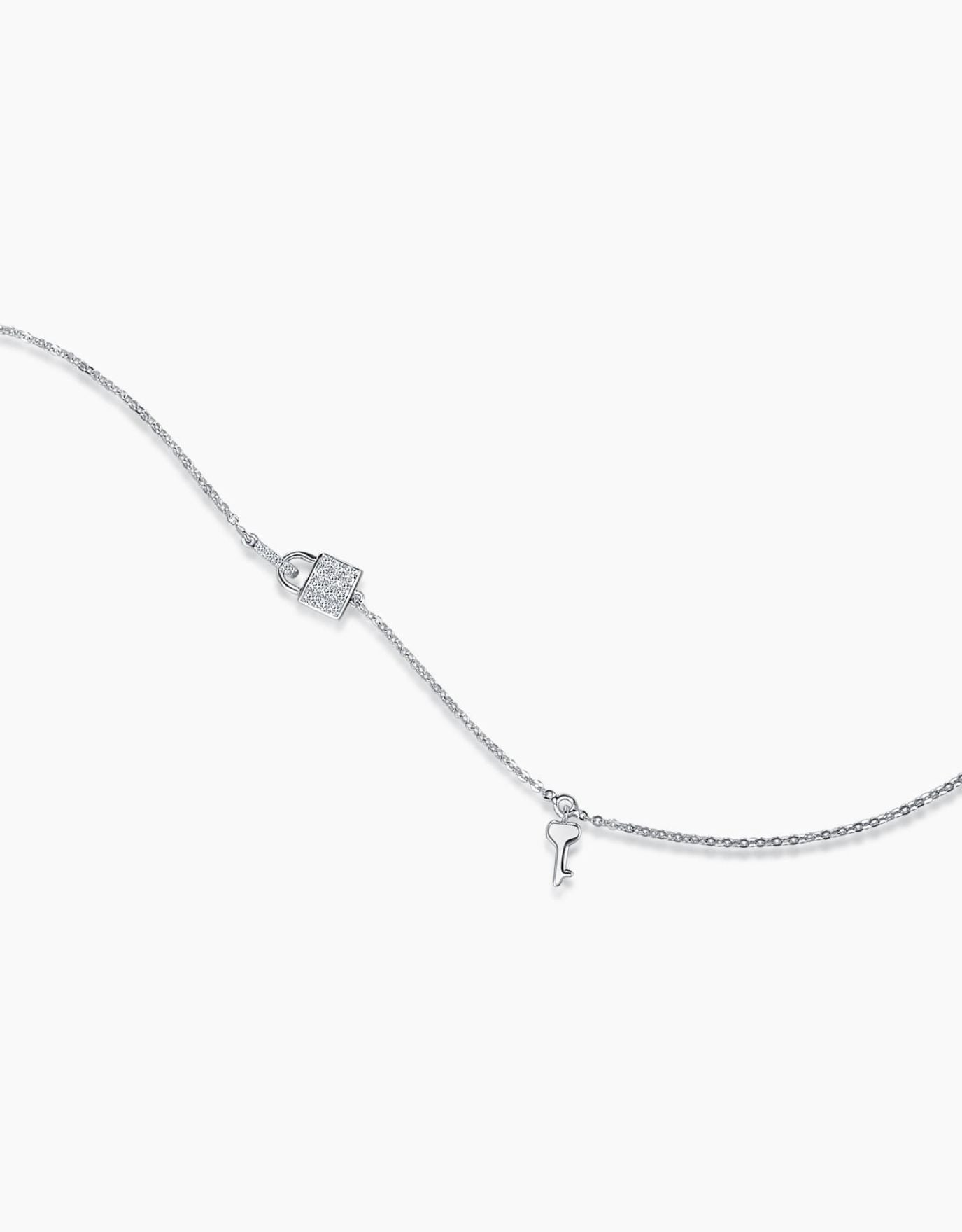 LVC Diamond Bracelet with a key and a lock dangling on the white gold  bracelet