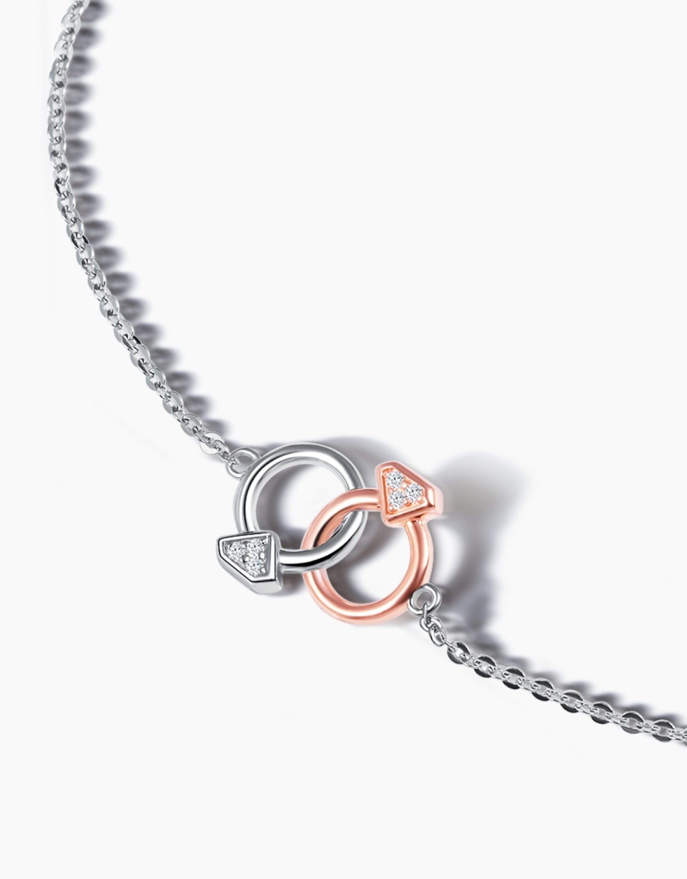 LVC diamond bracelet in white gold and rose gold from the lvc charmes collection featuring two interlocking mini rings