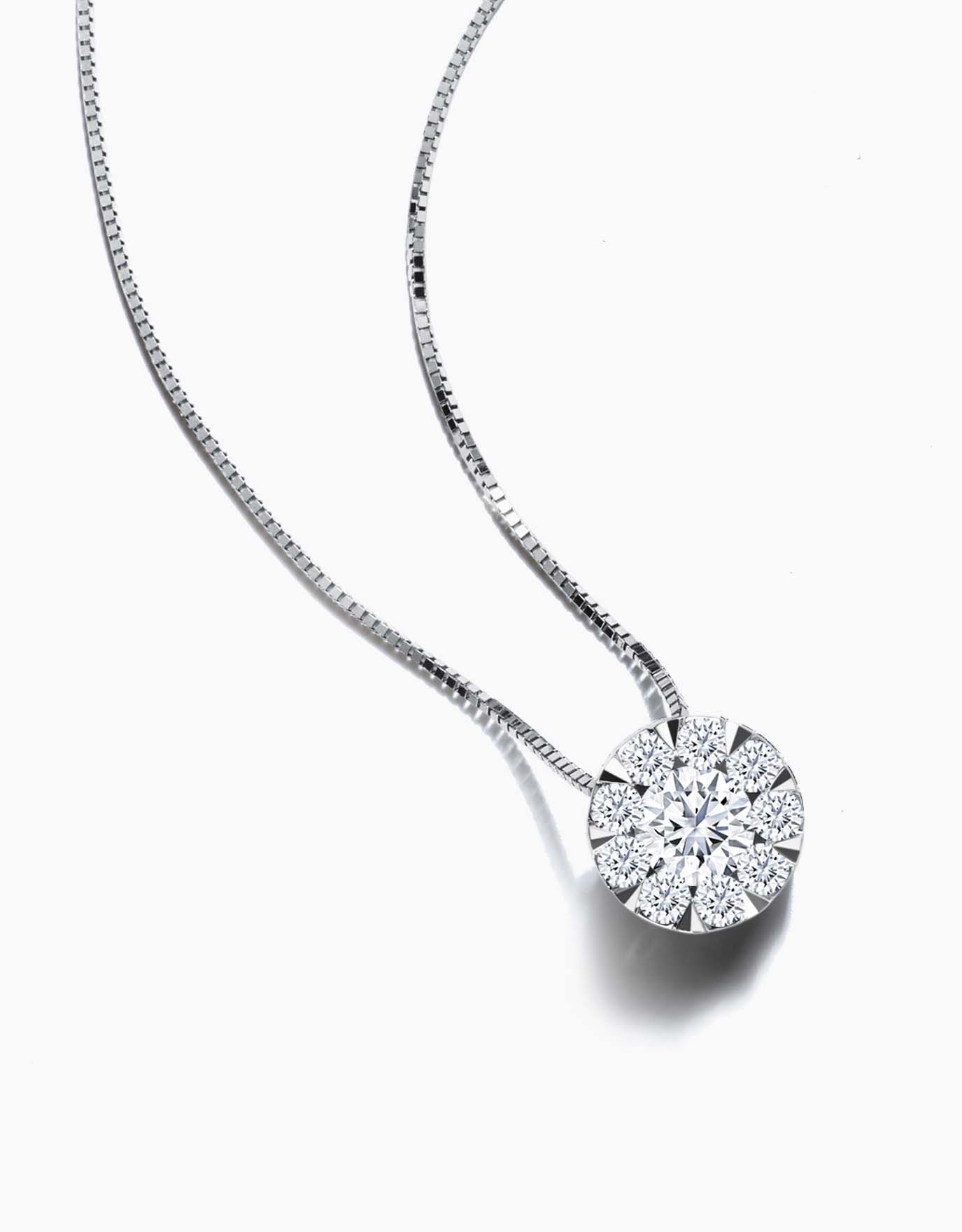 LVC necklace in white gold features a center brilliant diamond necklace surrounded with side diamonds