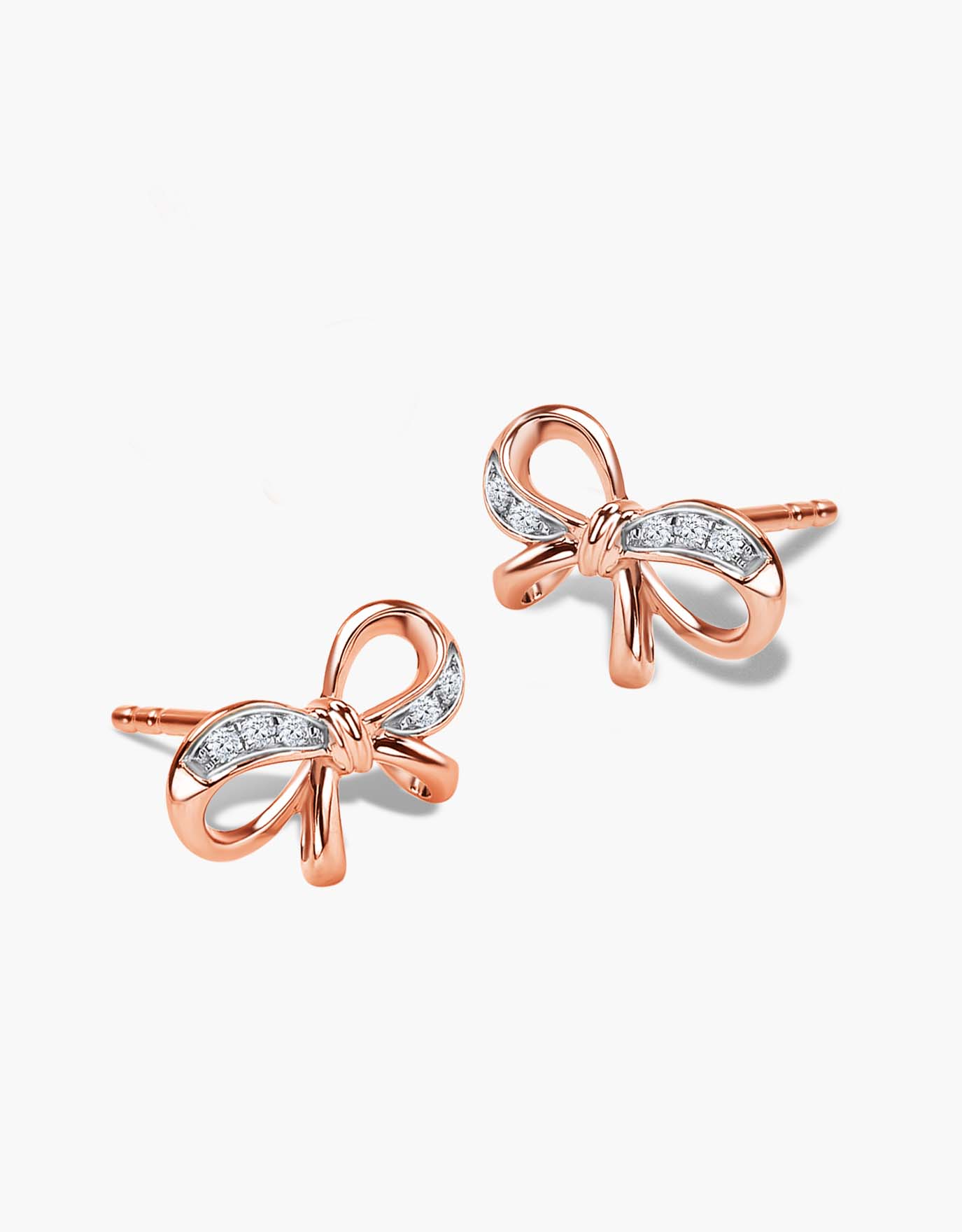 LVC diamond earrings in rose gold with a dainty bow design and 6 diamonds