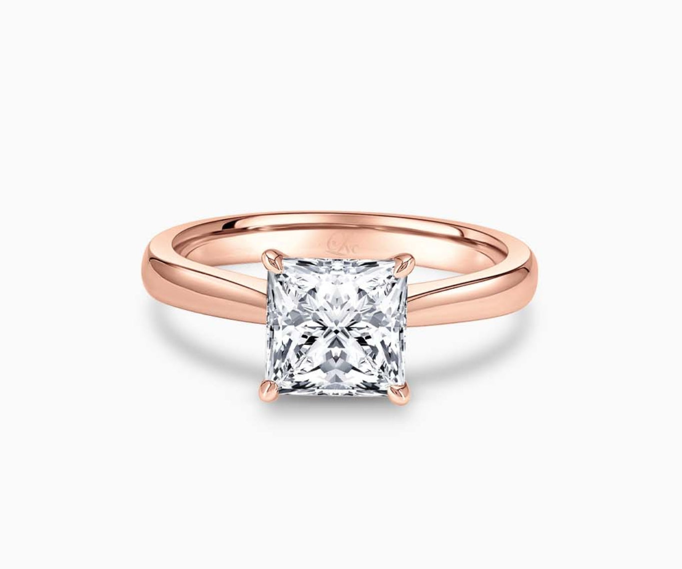 LVC solitaire ring with tapered plain band style that narrows the width towards the mount in rose gold