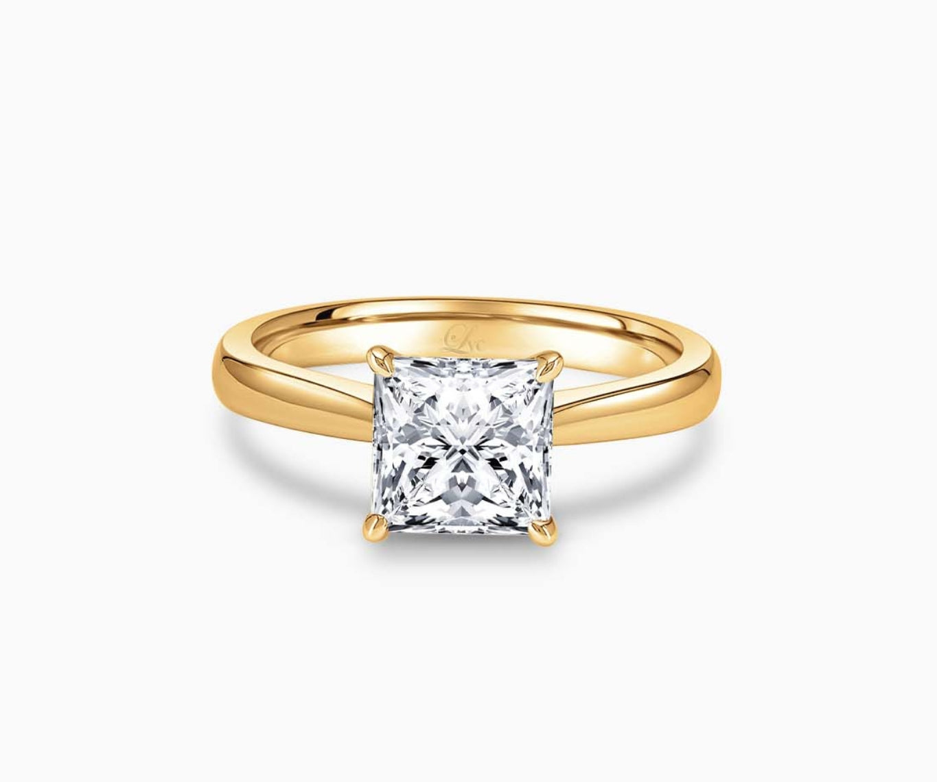 LVC solitaire ring with tapered plain band design which tapers inwards going from thick to thin with a diamond on the centre in yellow gold