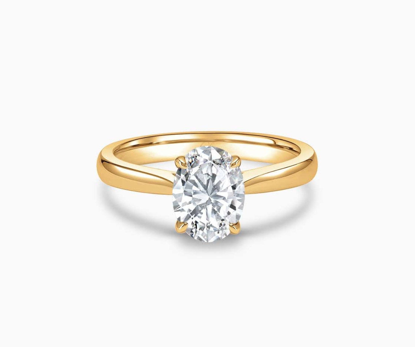 LVC solitaire ring with tapered plain band design which tapers inwards going from thick to thin and diamond on the centre in yellow gold