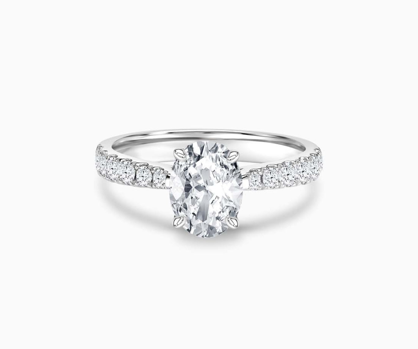 LVC solitaire ring with tapered pave band style, lined with side diamonds 