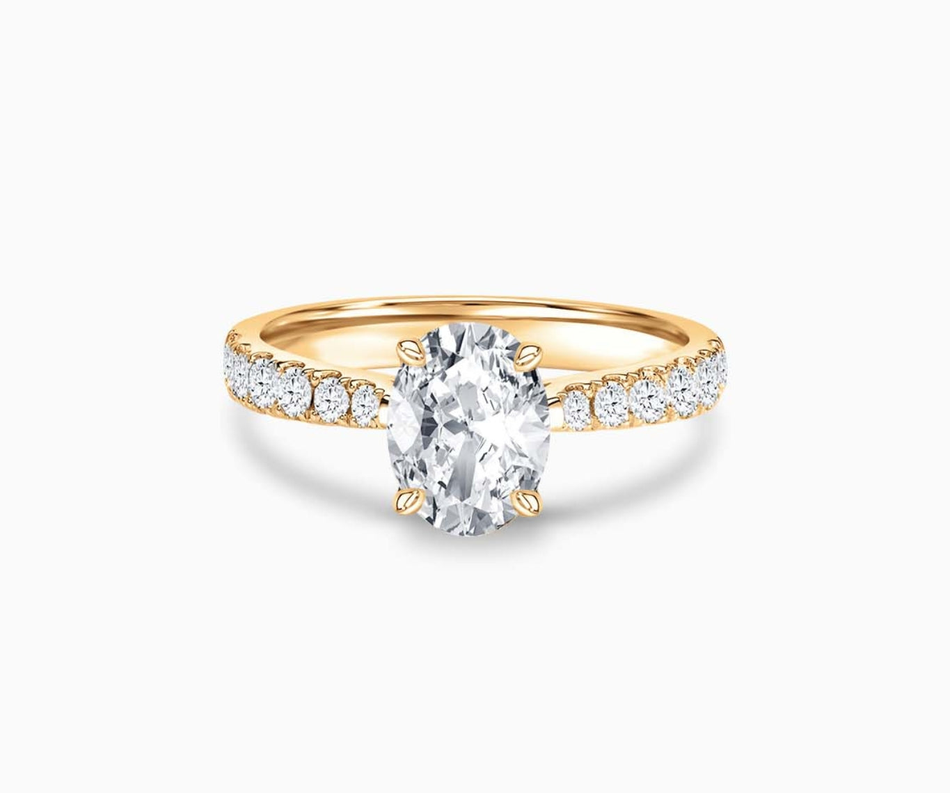 LVC solitaire rings with tapered pave band with centre diamond, and lined with side diamonds in yellow gold