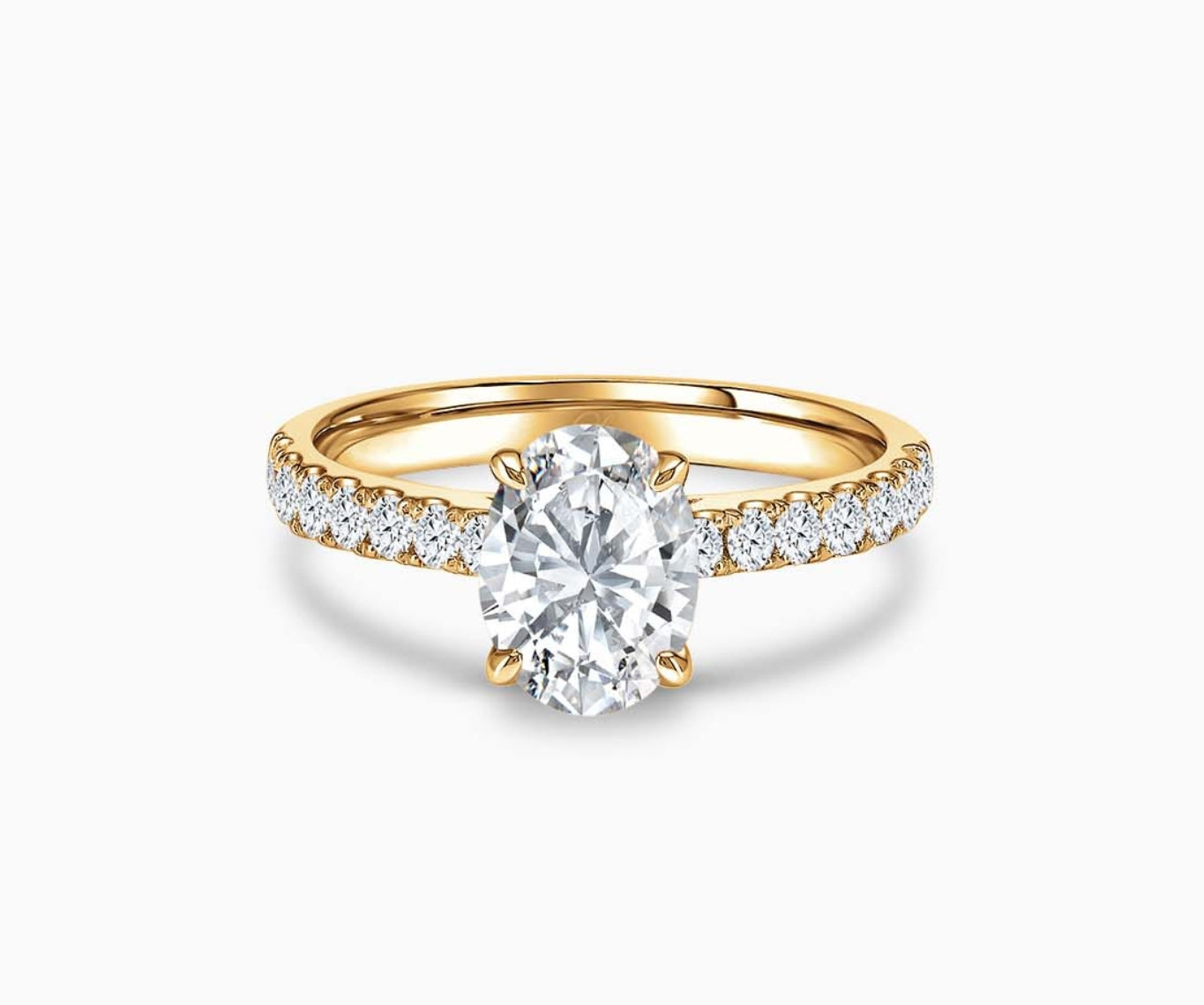 LVC solitaire ring with classic straight pave band lined with side diamonds in yellow gold