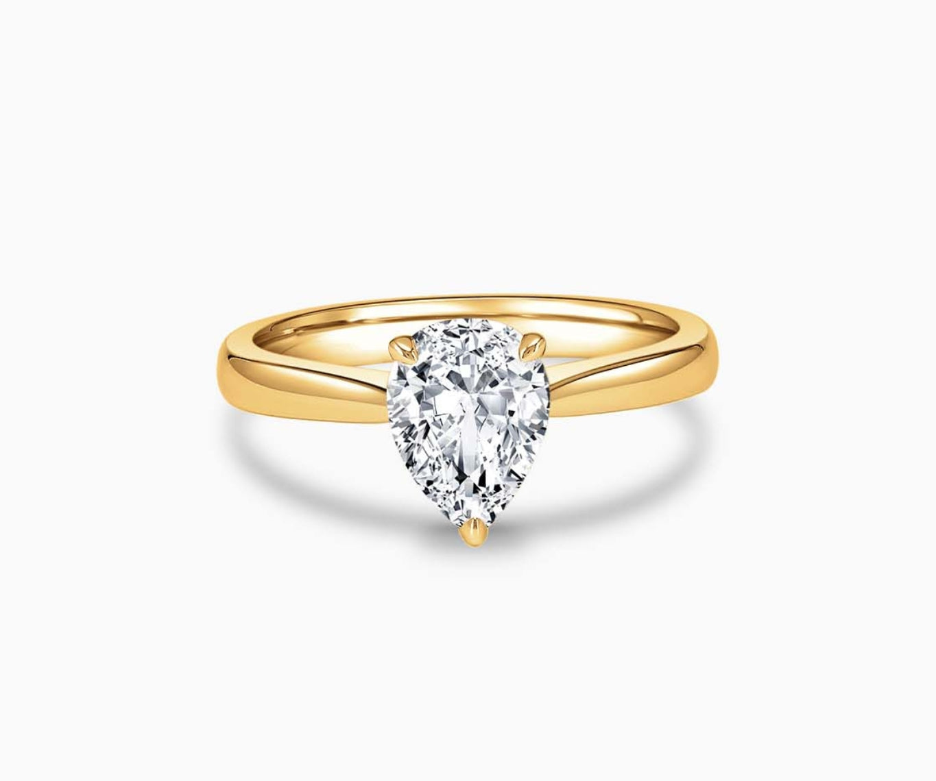 LVC solitaire ring with tapered plain band design which tapers inwards going from thick to thin and diamond on the centre in yellow gold