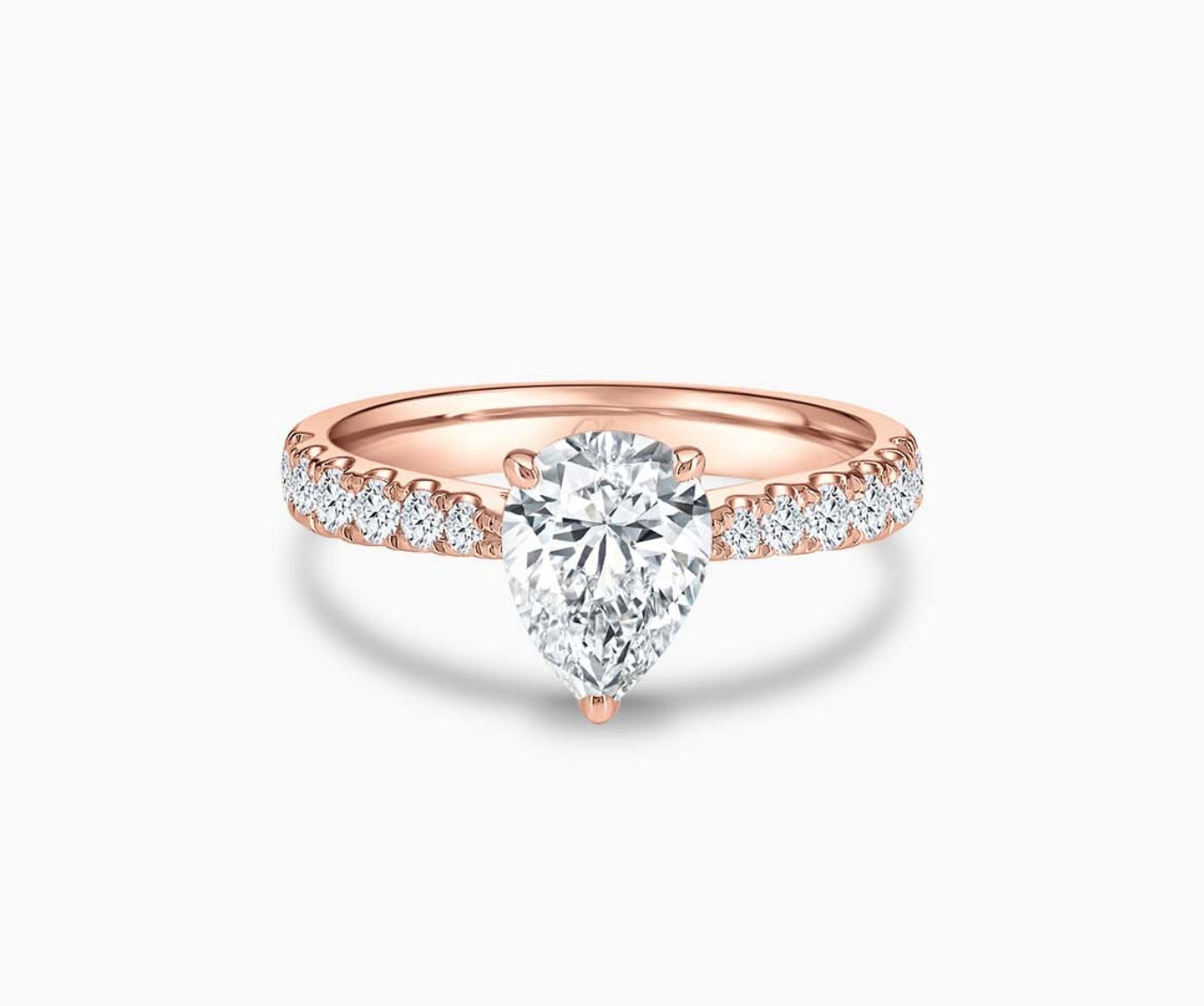 LVC solitaire rings with tapered pave band lined with diamonds and centred diamond in rose gold