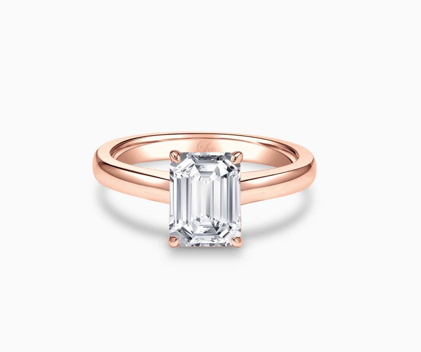 LVC solitaire ring with classic straight plain band with diamond on the centre in rose gold