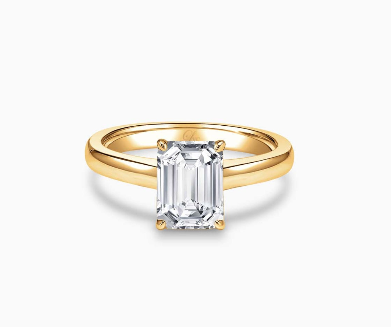 LVC solitaire ring with classic straight band and diamond on the centre in yellow gold 