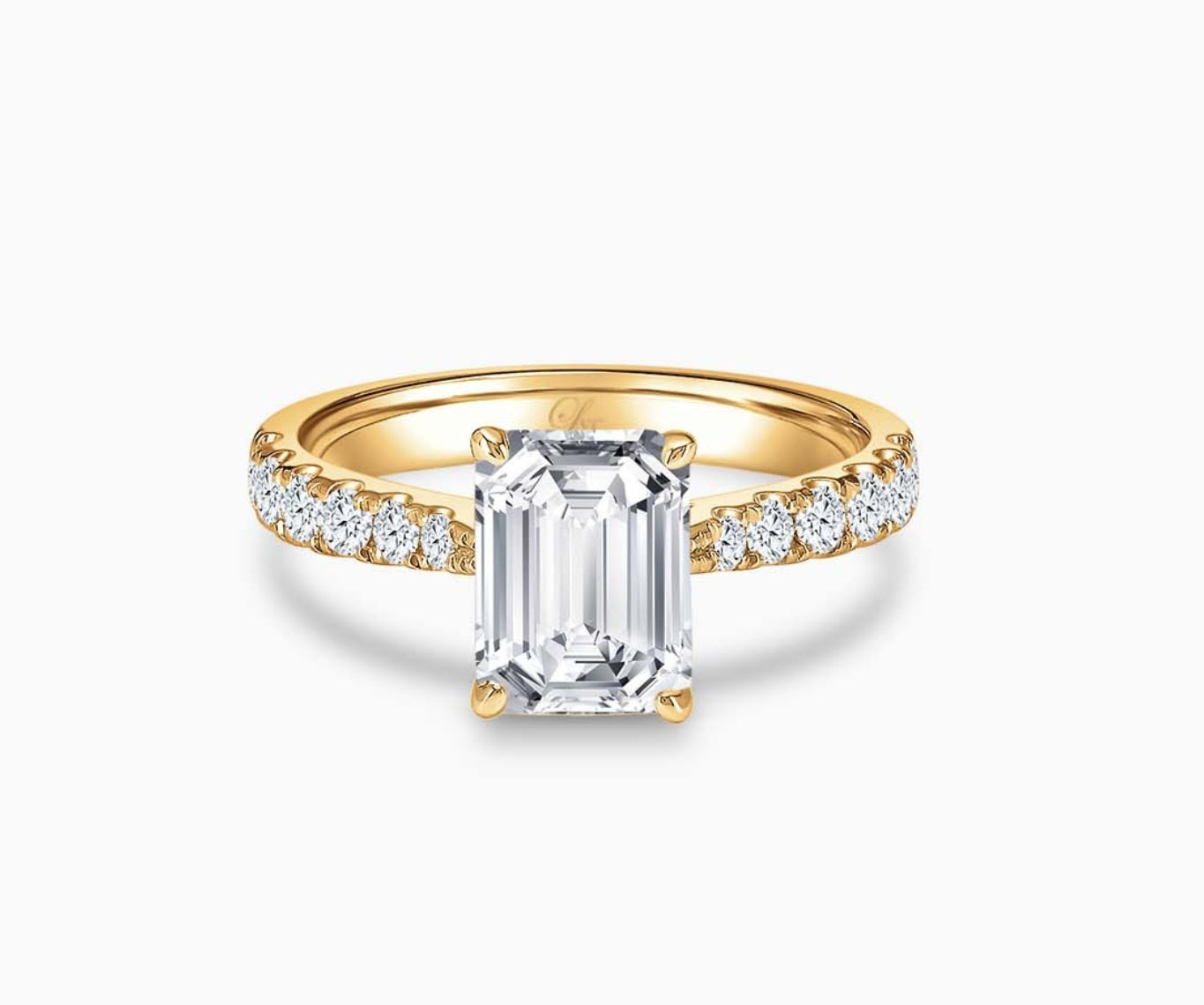 LVC solitaire rings with tapered pave band with centre diamond, and lined with side diamonds in yellow gold