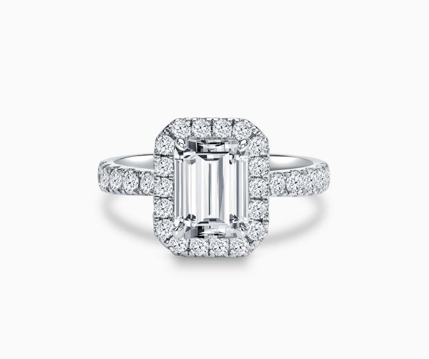 emerald cut diamond halo engagement ring with tapered pave band