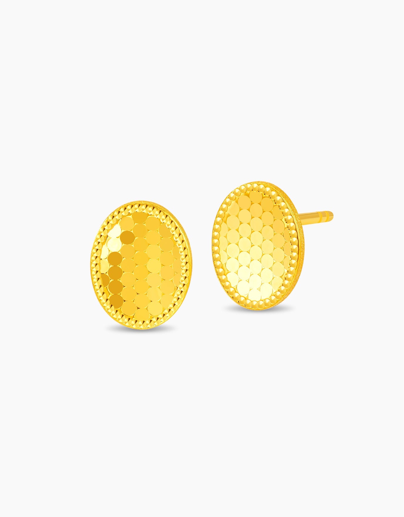 LVC stud earrings in 999 pure gold with faceted texture