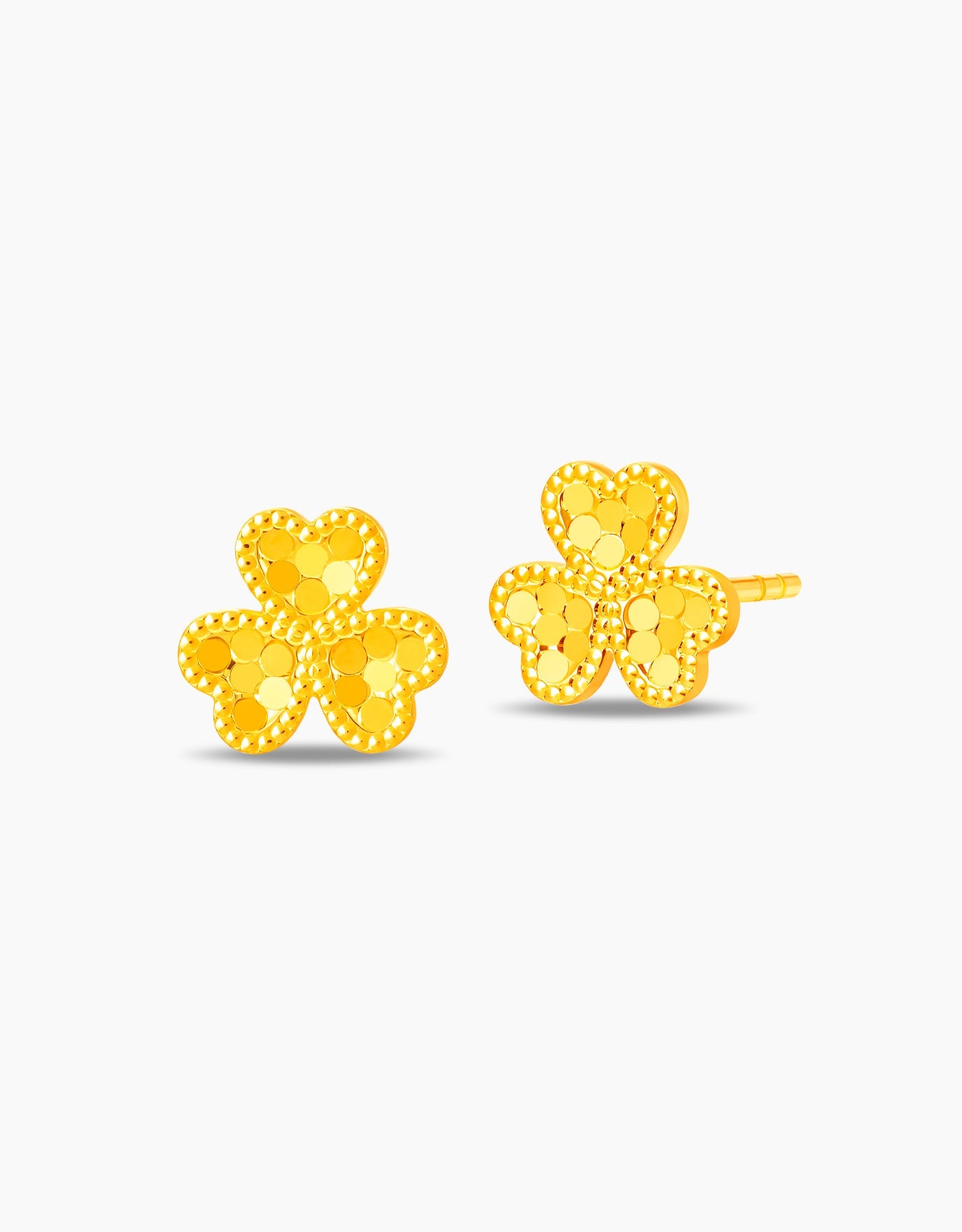 LVC stud earrings with honeycomb texture in 999 gold featuring three leaf clover design