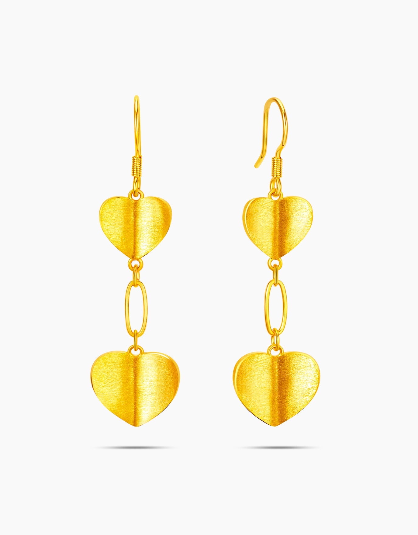 LVC dangling earrings with heart shaped pendants in 999 pure gold