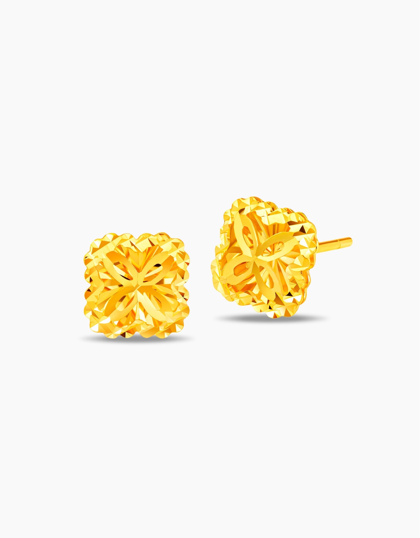 LVC stud earrings design inspired by botanical elements with faceted texture in 999 gold