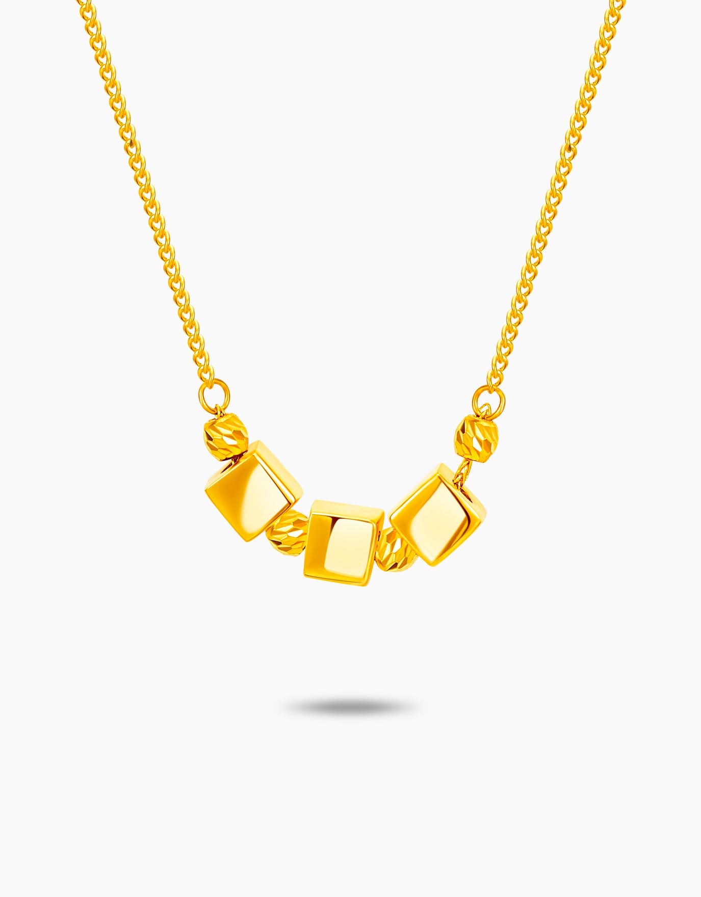 LVC necklace in 999 gold designed with three cubic squares  charms