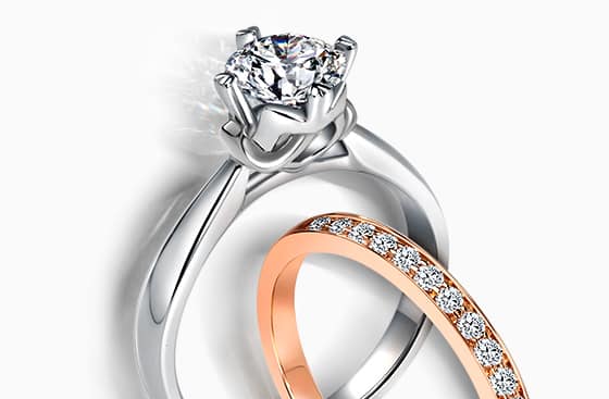 Solitaire white gold diamond engagement ring & rose gold diamond pave wedding band