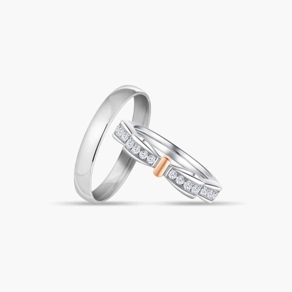 LVC NOEUD BOW WEDDING BAND WITH A ROSE GOLD KNOT AND DIAMONDS a set of white gold engagement wedding ring or wedding bands in white and rose gold with diamonds 钻石 戒指 cincin diamond