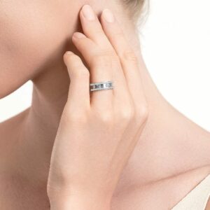 LVC PROMISE ETERNITY WEDDING BAND woman wearing a white gold engagement ring and wedding ring in 18k white gold with 32 diamonds