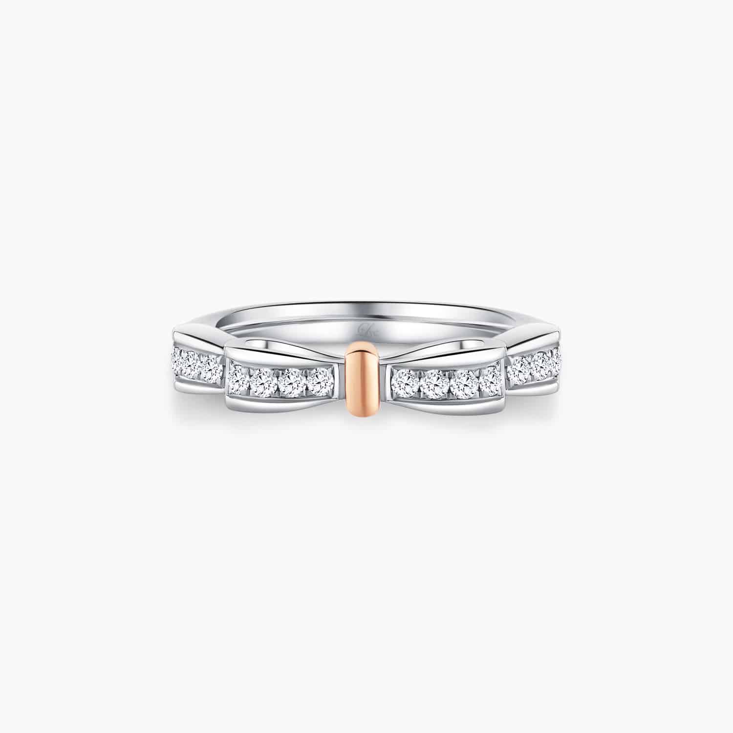 LVC NOEUD BOW WEDDING BAND WITH A ROSE GOLD KNOT AND DIAMONDS a white gold engagement wedding ring or wedding band for women in white and rose gold with 14 diamonds 钻石 戒指 cincin diamond