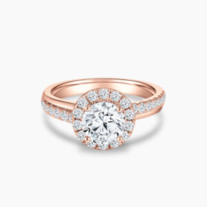 The Classic Halo diamond engagement ring in 18K rose gold with Double Pavé Band